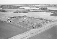 Aerial photograph of a farm in Saskatchewan (44-11-W3)