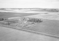 Aerial photograph of a farm in Saskatchewan (44-12-W3)