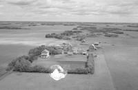 Aerial photograph of a farm in Saskatchewan (44-16-W3)