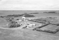 Aerial photograph of a farm in Saskatchewan (44-16-W3)