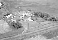 Aerial photograph of a farm in Saskatchewan (45-7-W3)