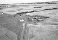 Aerial photograph of a farm in Saskatchewan (45-7-W3)