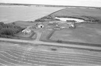 Aerial photograph of a farm in Saskatchewan (46-6-W3)