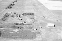 Aerial photograph of a farm in Saskatchewan (22-45-16-W3)