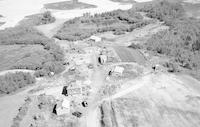 Aerial photograph of a farm in Saskatchewan (23-45-16-W3)