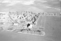 Aerial photograph of a farm in Saskatchewan (46-18-W3)