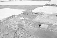 Aerial photograph of a farm in Saskatchewan (46-18-W3)