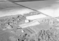 Aerial photograph of a farm in Saskatchewan (46-18-W3)