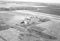 Aerial photograph of a farm in Saskatchewan (47-5-W3)