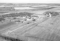 Aerial photograph of a farm in Saskatchewan (47-5-W3)