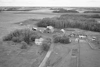 Aerial photograph of a farm in Saskatchewan (48-4-W3)