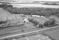 Aerial photograph of a farm in Saskatchewan (48-4-W3)