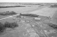 Aerial photograph of a farm in Saskatchewan (48-4-W3)