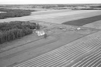 Aerial photograph of a farm in Saskatchewan (48-4-W3)