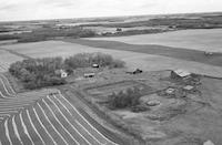 Aerial photograph of a farm in Saskatchewan (48-4-W3)