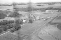 Aerial photograph of a farm in Saskatchewan (48-23-W3)