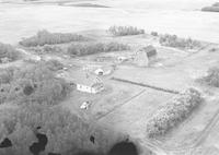 Aerial photograph of a farm in Saskatchewan (48-23-W3)