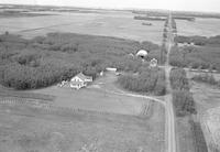 Aerial photograph of a farm in Saskatchewan (48-23-W3)