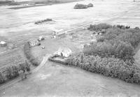 Aerial photograph of a farm in Saskatchewan (48-23-W3)