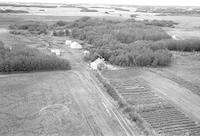 Aerial photograph of a farm in Saskatchewan (48-23-W3)