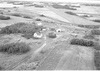 Aerial photograph of a farm in Saskatchewan (48-23-W3)