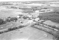 Aerial photograph of a farm in Saskatchewan (48-24-W3)