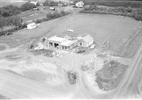 Aerial photograph of a farm in Saskatchewan (48-24-W3)