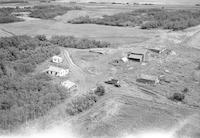 Aerial photograph of a farm in Saskatchewan (48-24-W3)