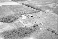 Aerial photograph of a farm in Saskatchewan (29-48-24-W3)