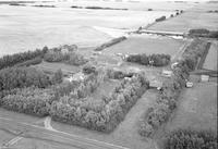 Aerial photograph of a farm in Saskatchewan (23-48-24-W3)