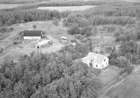 Aerial photograph of a farm in Saskatchewan (9-48-24-W3)