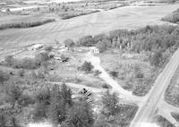 Aerial photograph of a farm in Saskatchewan (49-2-W3)