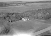 Aerial photograph of a farm in Saskatchewan (49-2-W3)