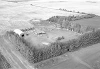 Aerial photograph of a farm in Saskatchewan (49-2-W3)