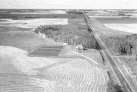 Aerial photograph of a farm in Saskatchewan (49-2-W3)