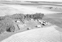 Aerial photograph of a farm in Saskatchewan (49-2-W3)