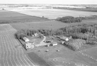 Aerial photograph of a farm in Saskatchewan (49-2-W3)