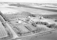 Aerial photograph of a farm in Saskatchewan (49-2-W3)