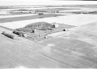 Aerial photograph of a farm in Saskatchewan (49-2-W3)