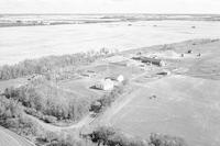 Aerial photograph of a farm in Saskatchewan (49-2-W3)