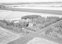 Aerial photograph of a farm in Saskatchewan (49-2-W3)