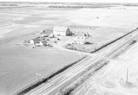 Aerial photograph of a farm in Saskatchewan (49-2-W3)