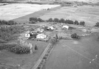 Aerial photograph of a farm in Saskatchewan (49-3-W3)