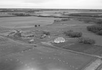 Aerial photograph of a farm in Saskatchewan (49-3-W3)