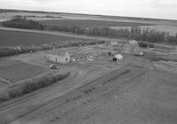 Aerial photograph of a farm in Saskatchewan (49-3-W3)