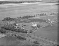 Aerial photograph of a farm in Saskatchewan (49-3-W3)