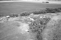 Aerial photograph of a farm in Saskatchewan (49-3-W3)