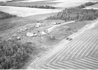 Aerial photograph of a farm in Saskatchewan (49-3-W3)