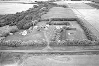 Aerial photograph of a farm in Saskatchewan (49-3-W3)