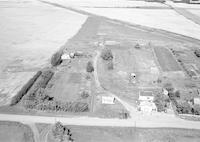 Aerial photograph of a farm in Saskatchewan (49-19-W3)